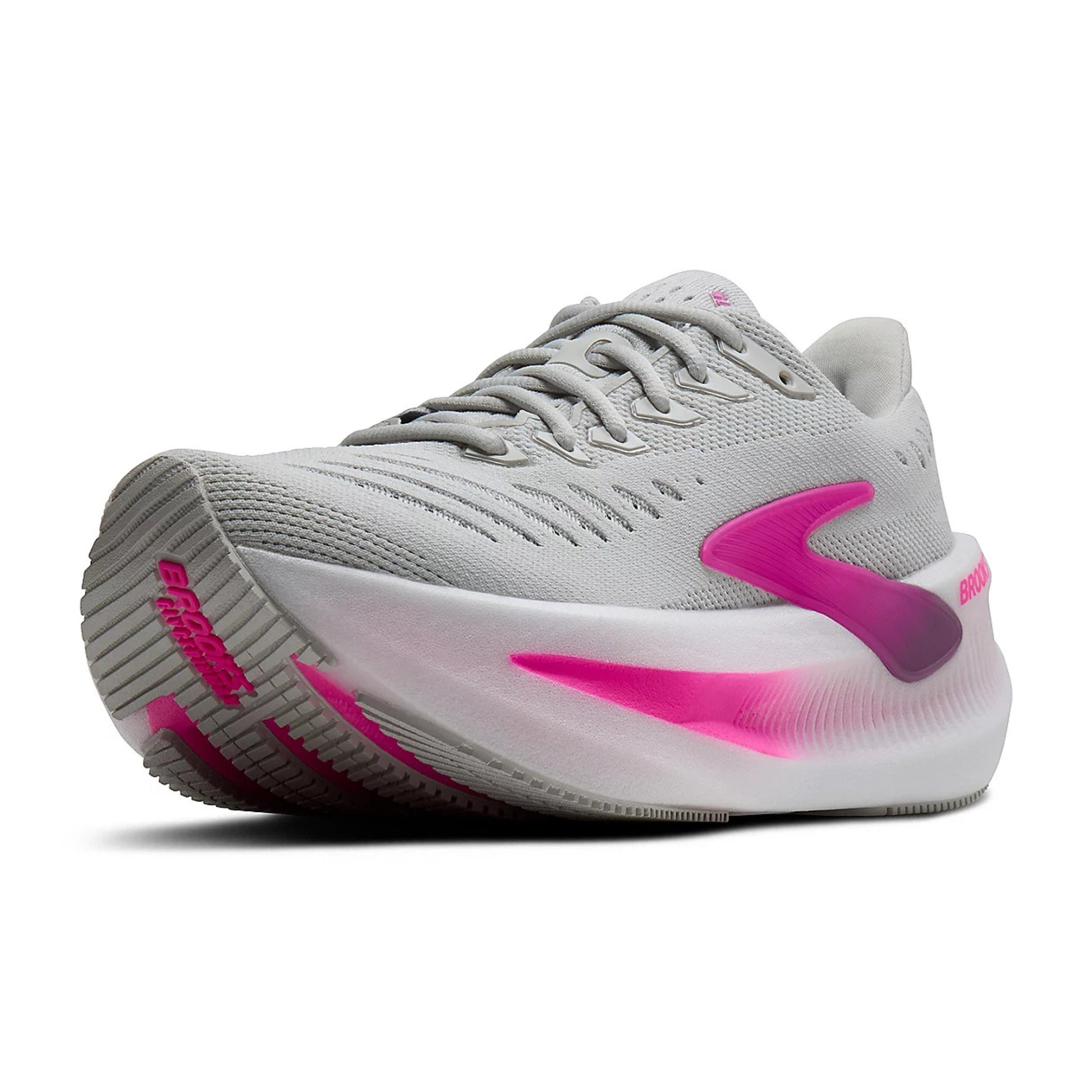 Gray and pink Brooks running shoe on a white background