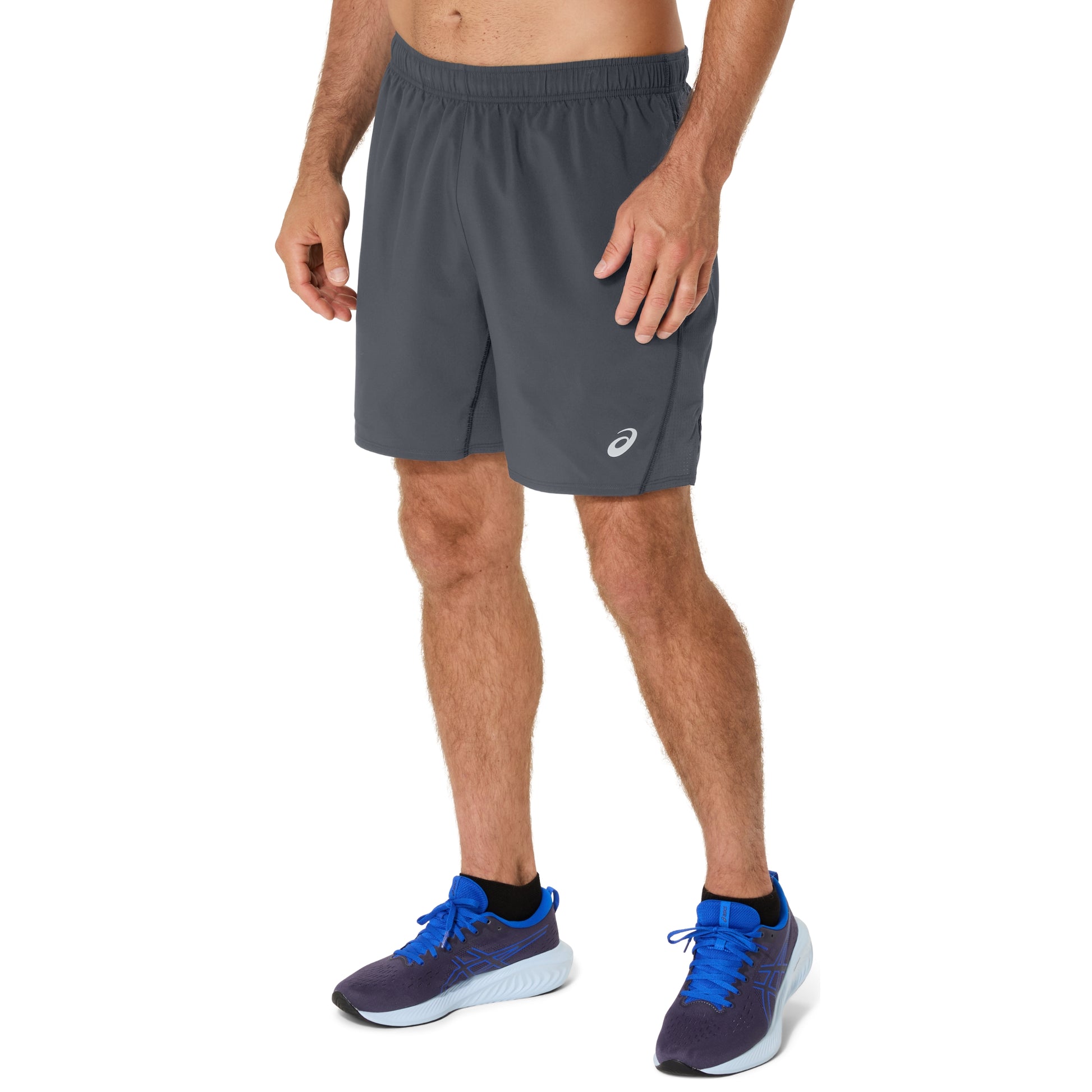 Person wearing gray running shorts with a brand logo on a white background