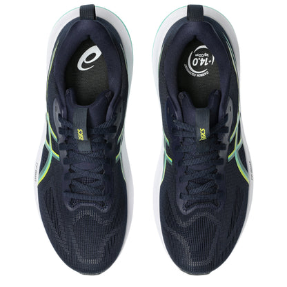 Navy running shoes with green accents on a white background
