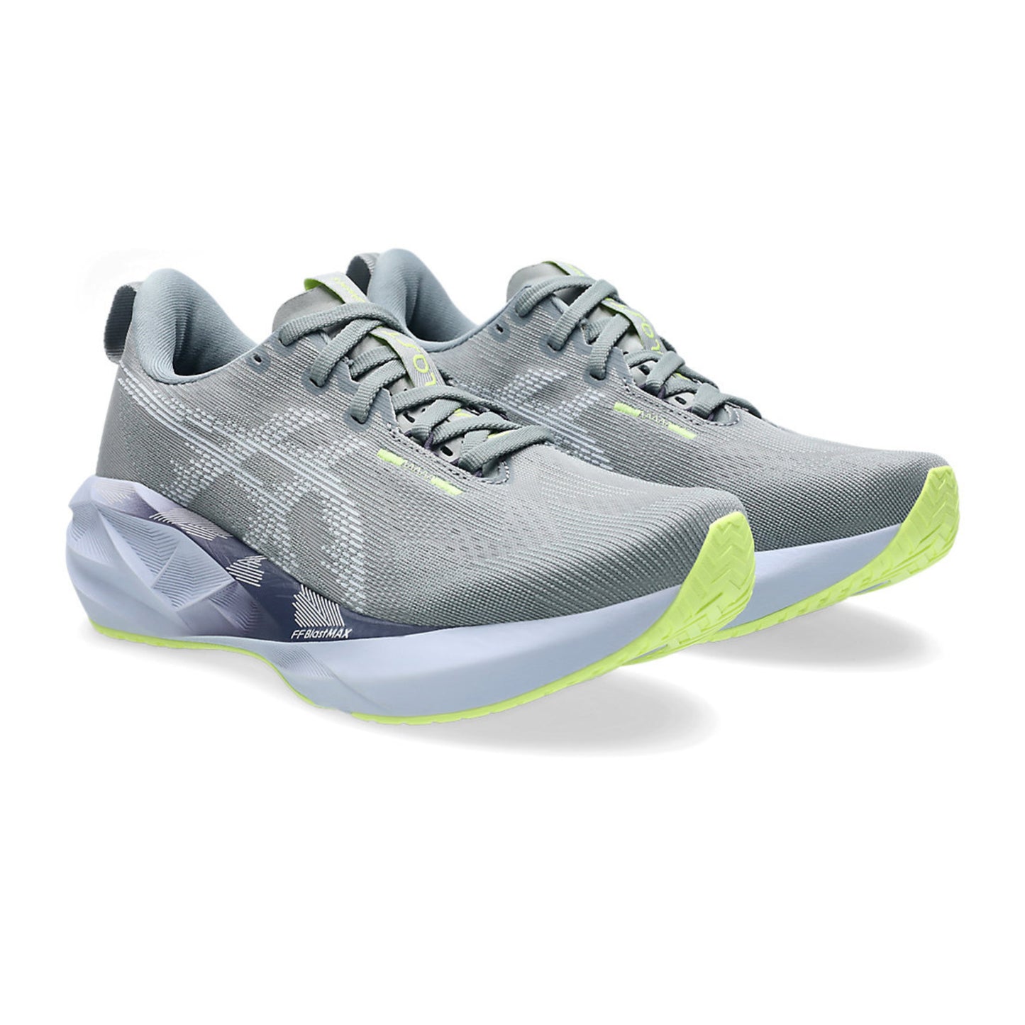 Gray running shoe with green accents on a white background