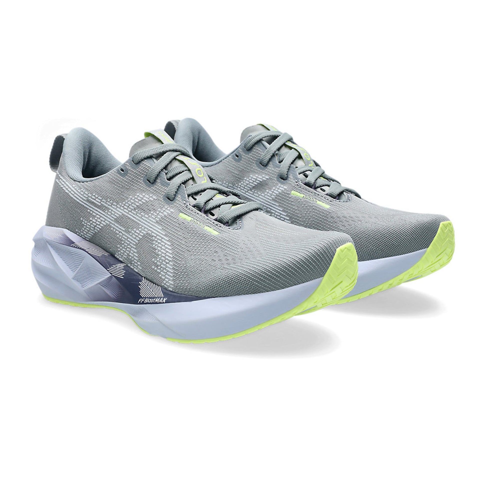 Gray running shoe with green accents on a white background