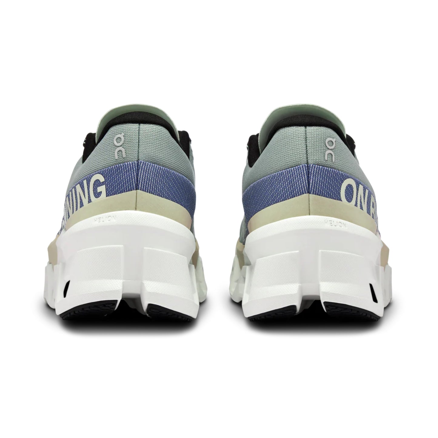 Pair of green running shoes with blue accents on a white background