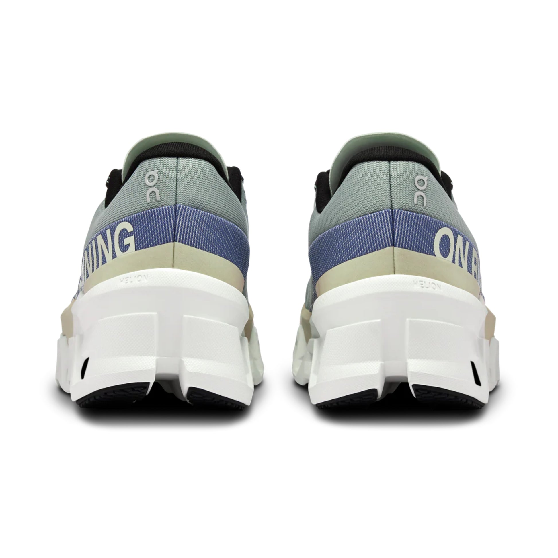 Pair of green running shoes with blue accents on a white background