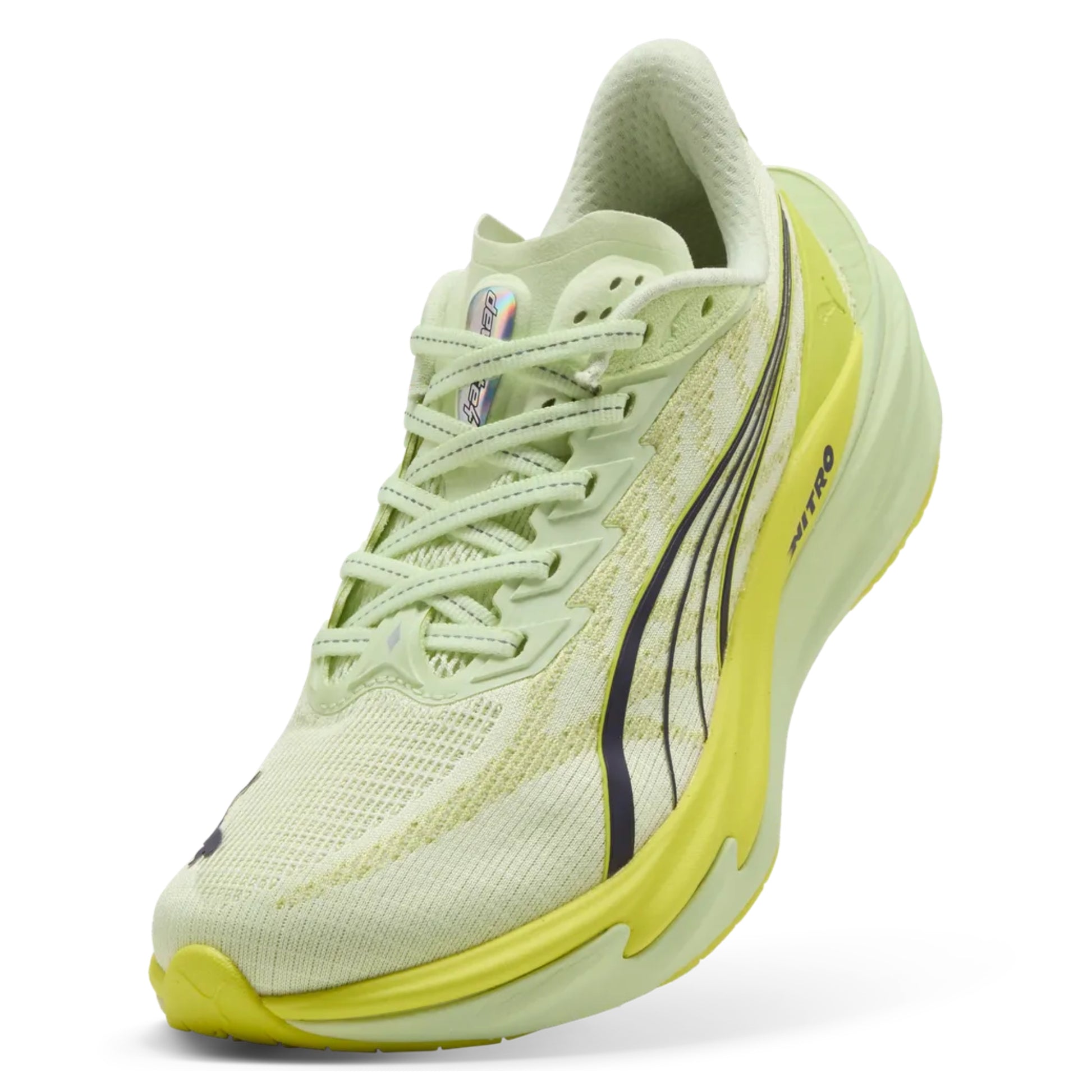 Light green Puma running shoe with yellow sole on a white background