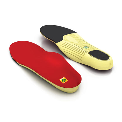 Red and yellow shoe insoles on a white background