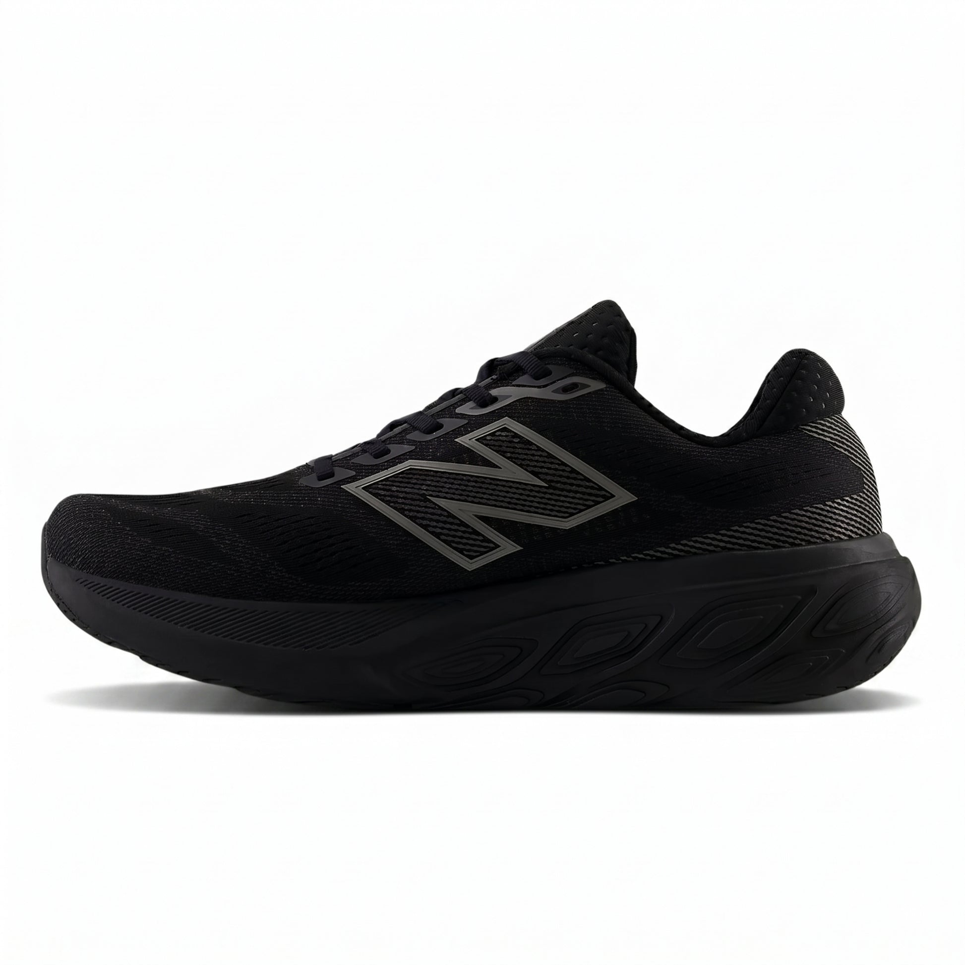 Black New Balance running with unique sole design on a white background