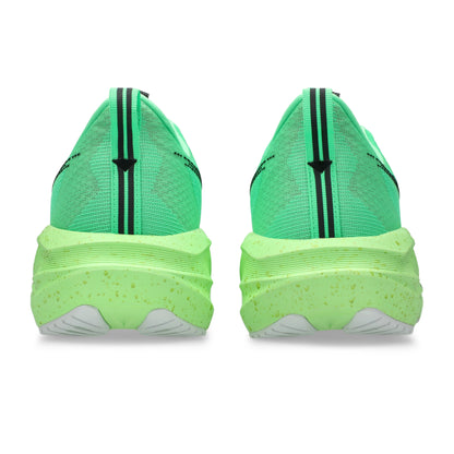 Green Asics running shoes with a white sole on a white background