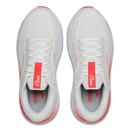 White running shoes with red accents on a white background