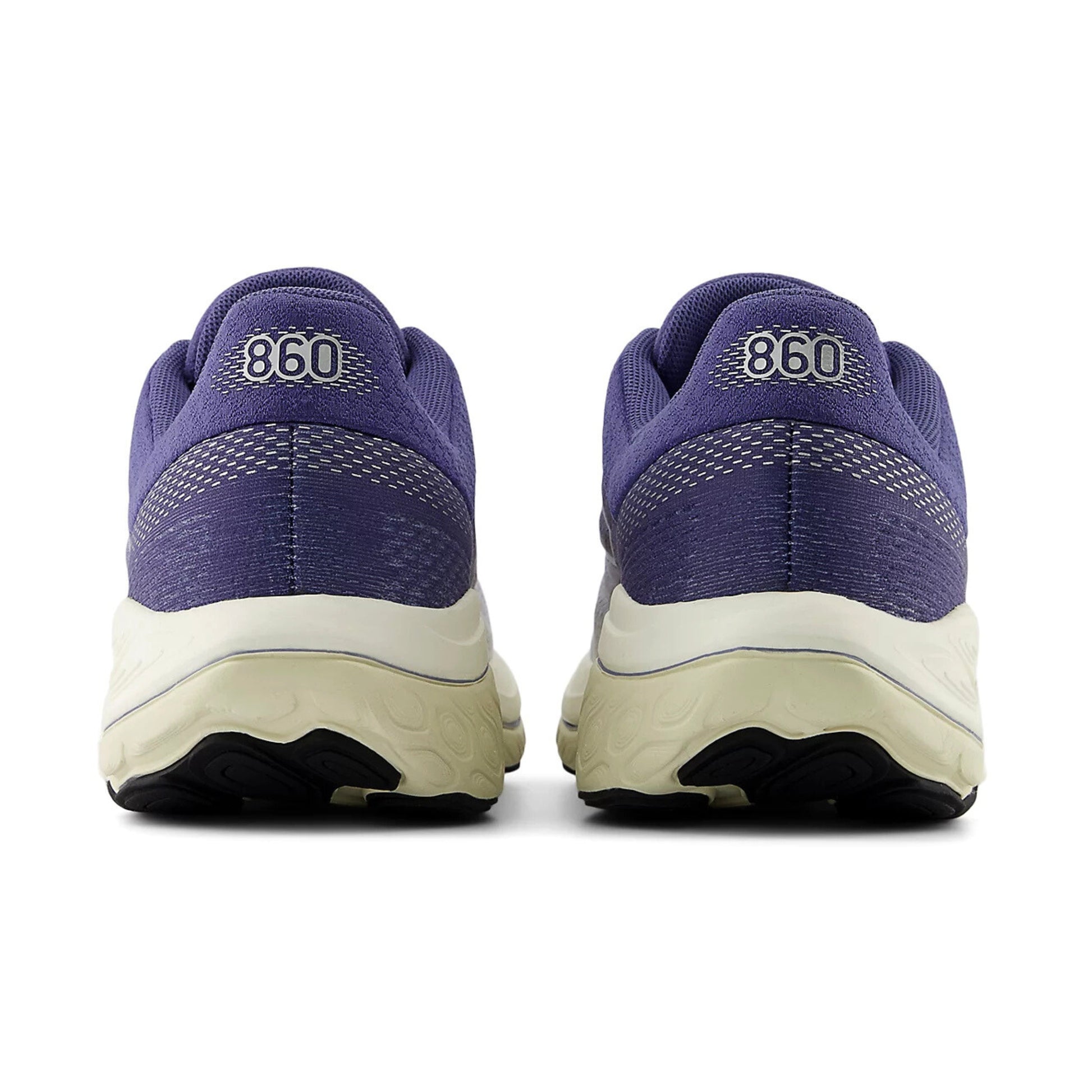 Purple running shoes with '860' branding on a white background