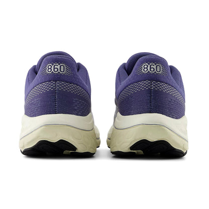 Purple running shoes with '860' branding on a white background