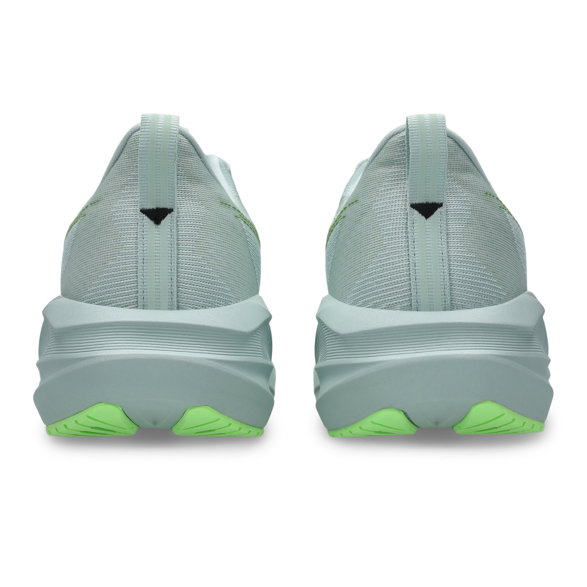 Light blue running shoes with green accents on a white background