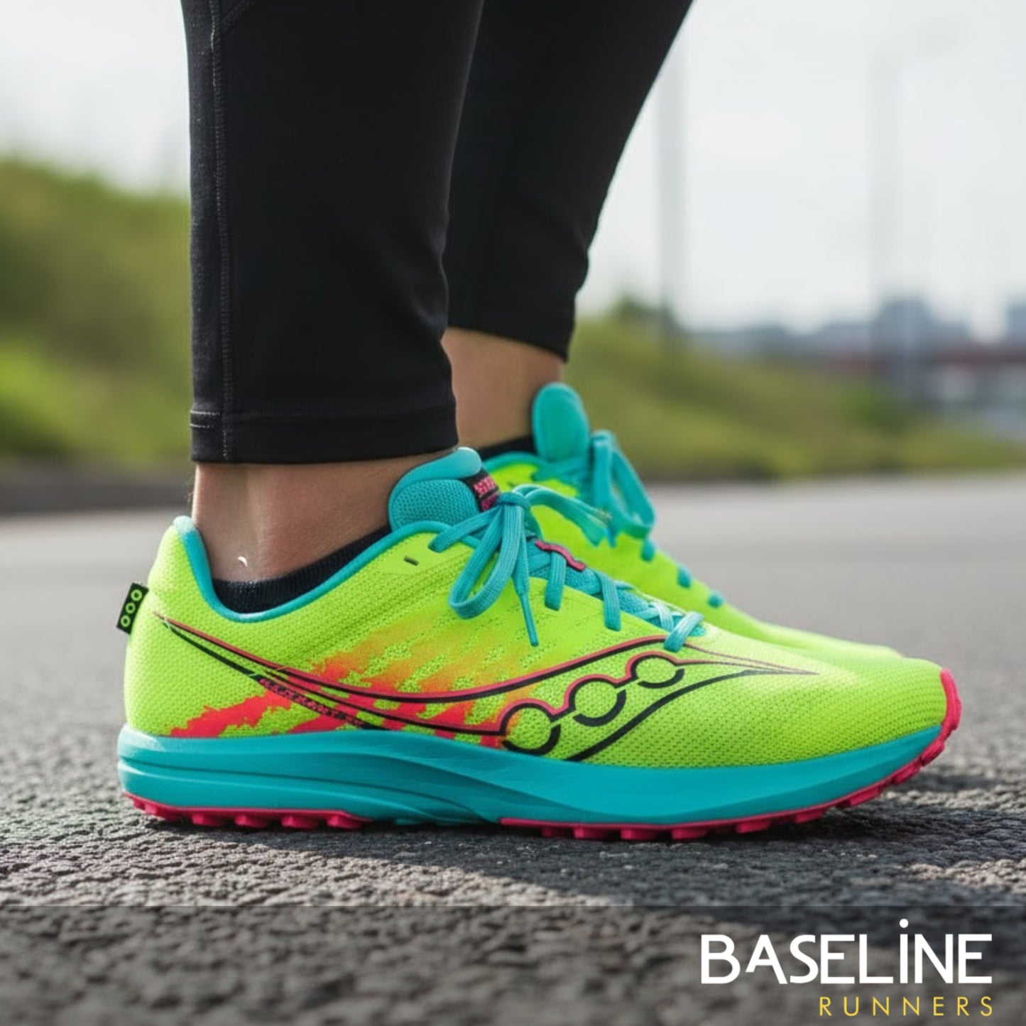 Brightly colored running shoe on a road with 'Baseline Runners' branding.