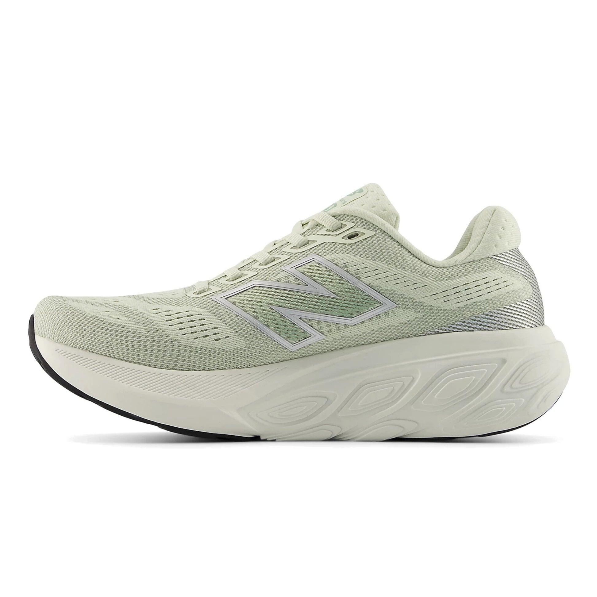 Light green running shoe with New Balance logo on a white background