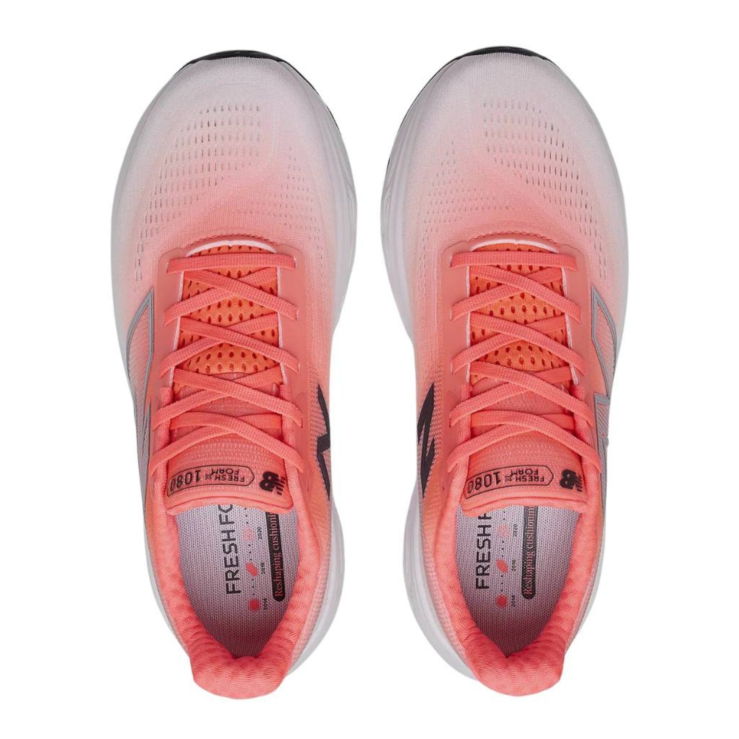Pair of coral New Balance running shoes with white soles on a white background