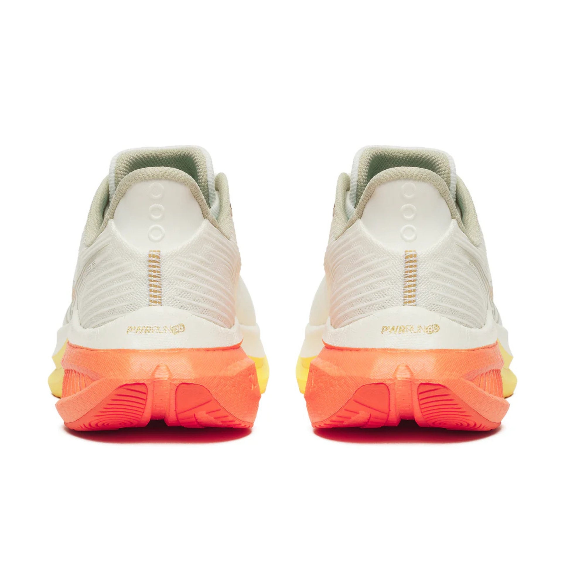 Pair of Saucony running shoes showing the back view and the sole with orange cushioning on a white background