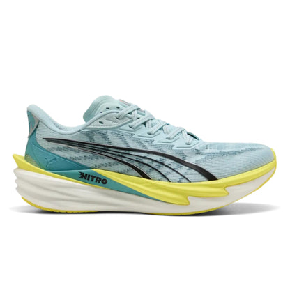 Light blue Puma running shoe with yellow accents on a white background