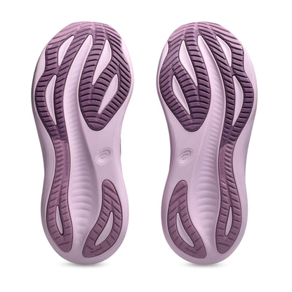 Pair of ube shoe soles on a white background
