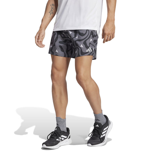 Man wearing Adidas grey patterned short 