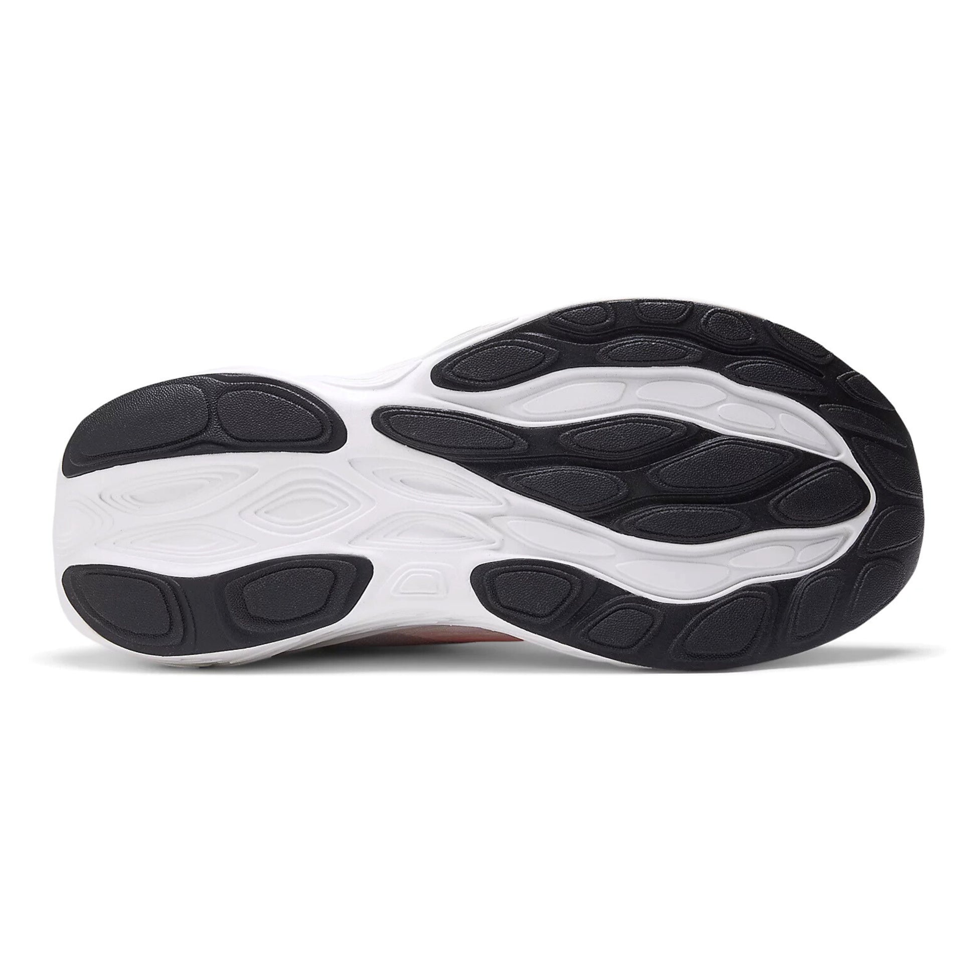 Close-up of a running shoe sole with black and white design on a white background