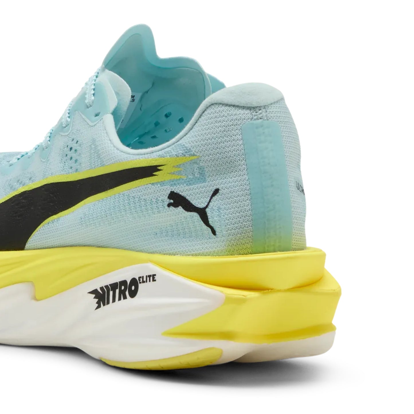 Light blue and yellow running shoe with Puma logo on a white background