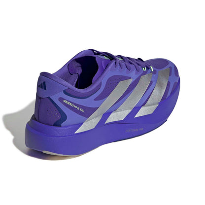 A blue Adidas running shoe with metallic silver stripes, shown from a three-quarters angle on a white background.