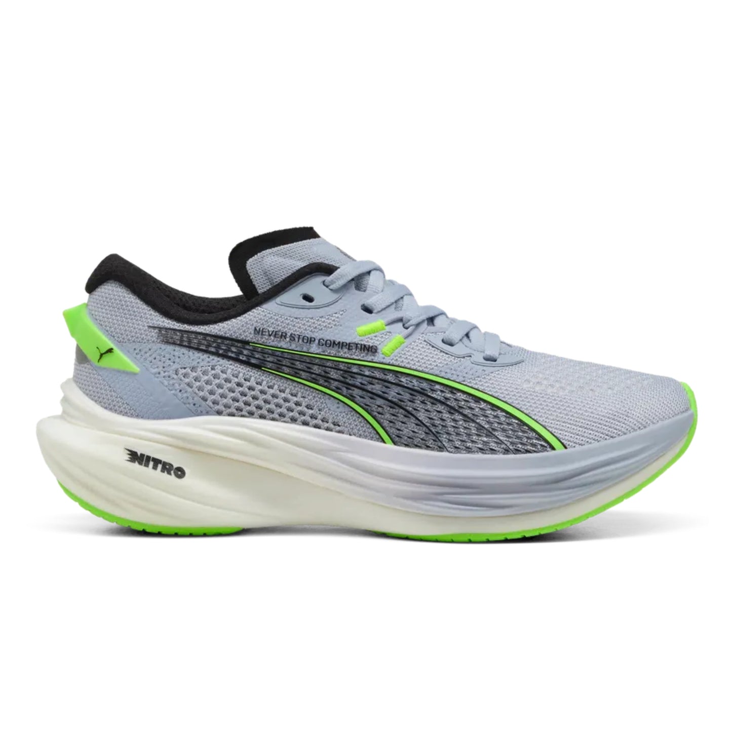 Gray Puma running shoe with green accents on a white background 