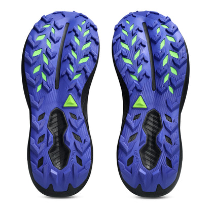Blue and green sole of a shoe with textured pattern on a white background
