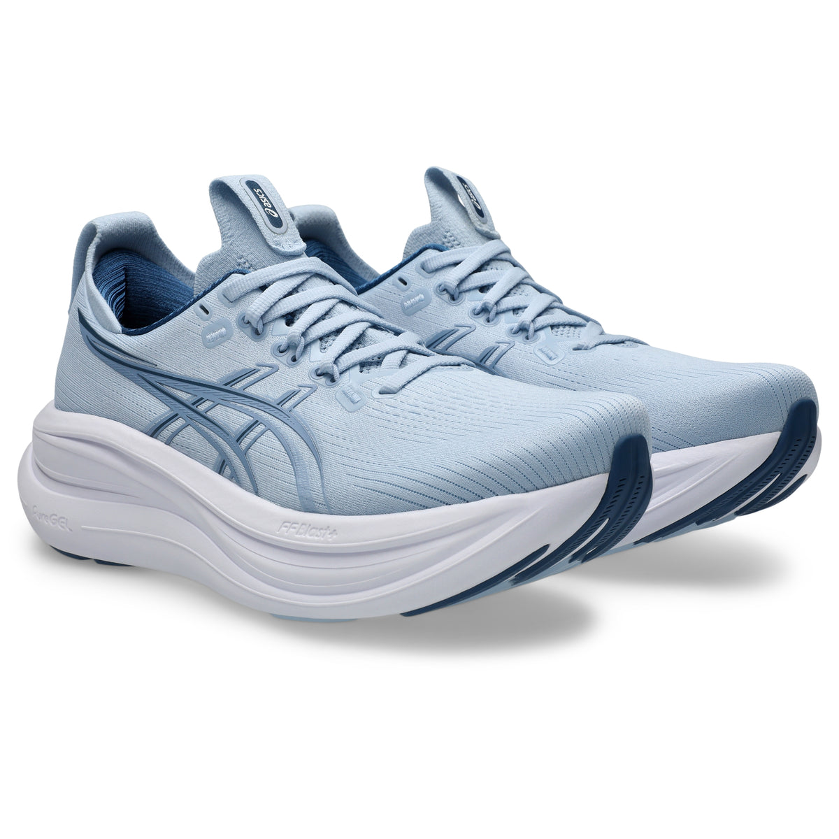 A pair of light blue and white running shoes with dark blue accents, displayed on a clean white background.