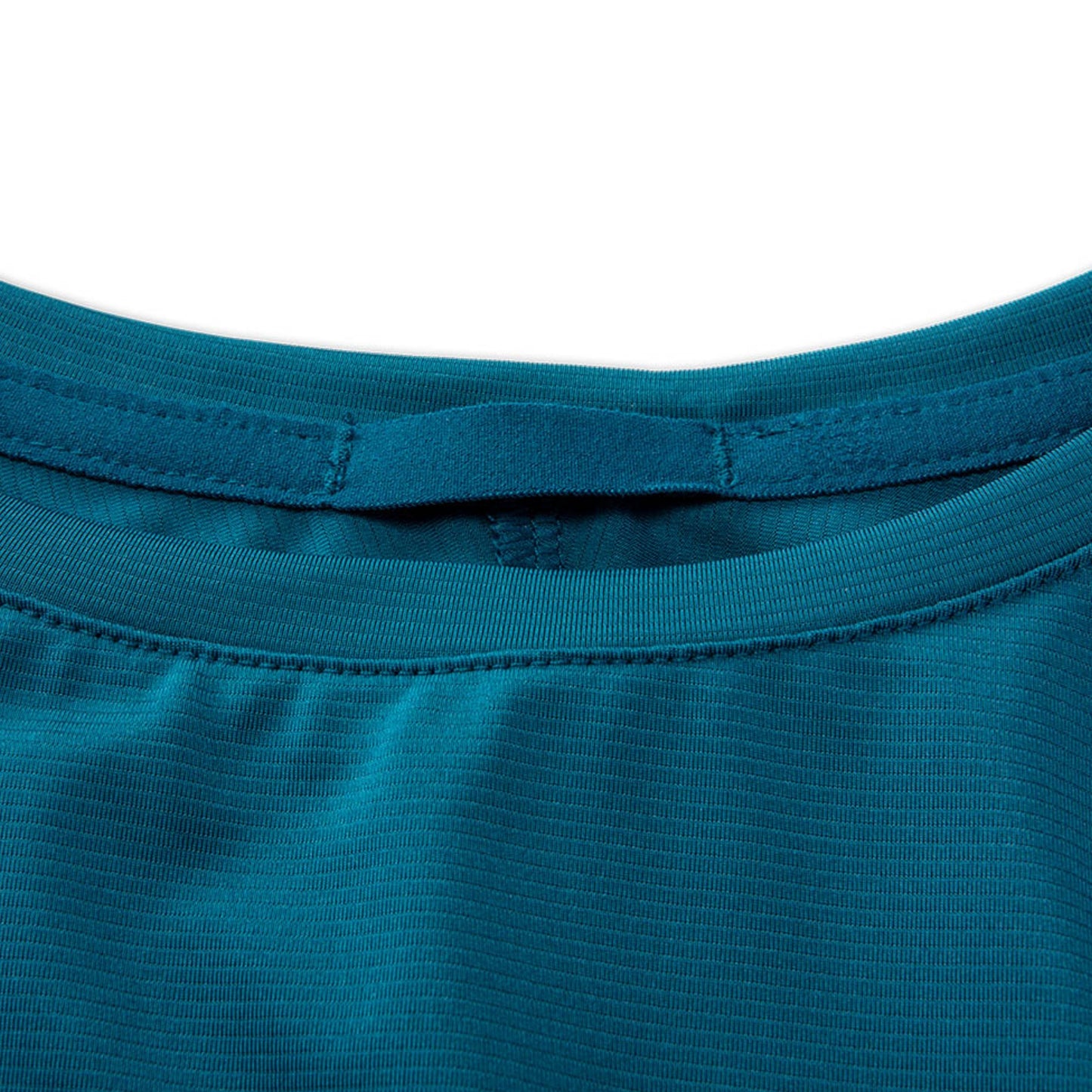 Close-up of a blue shirt neck on a white background